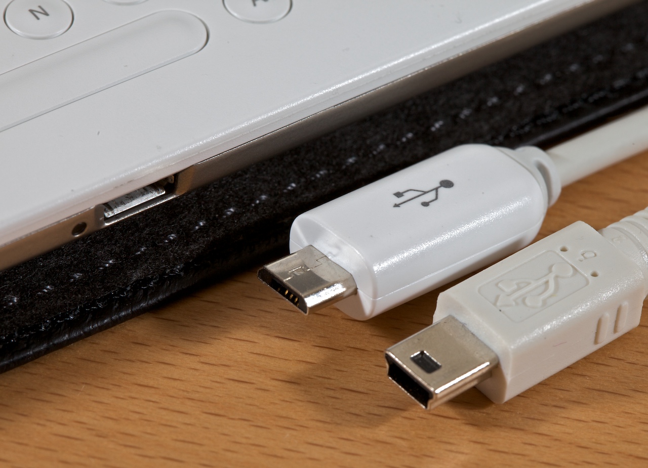 Pictured left to right: Kindle 2's power/USB port, its Micro-USB 